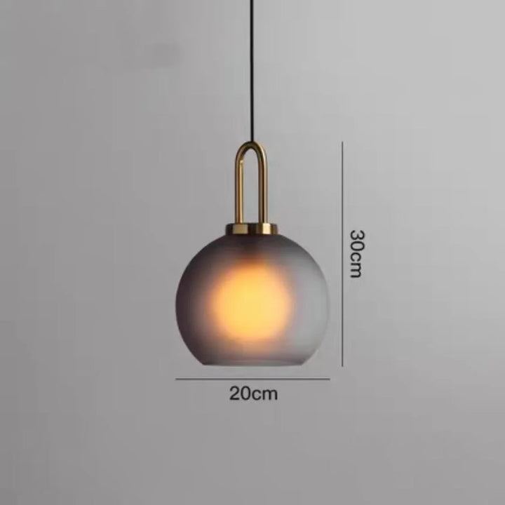 Frosted glass pendant light with metal top measuring 30 cm high and 20 cm wide with 1.5 m adjustable wire