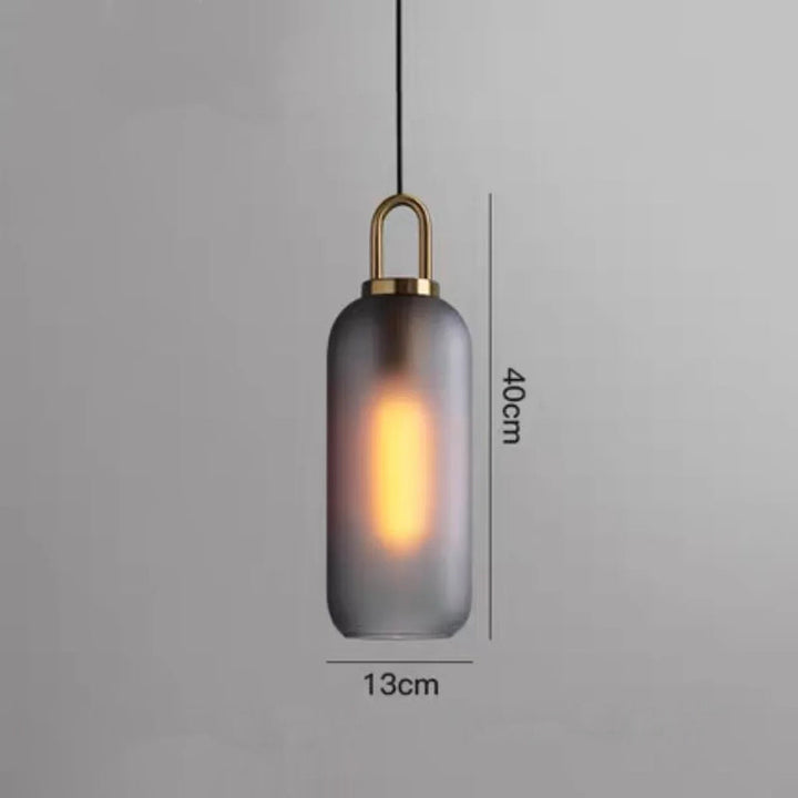 Frosted grey glass cylinder pendant light with metal top measuring 15.7 in (40 cm) high and 5.1 in (13 cm) wide, E27 fitting