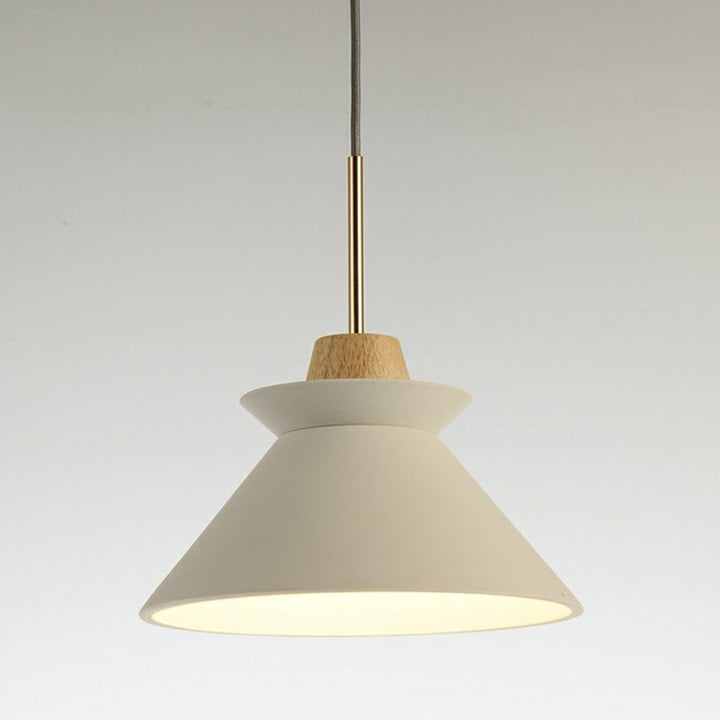 Cream white Nordic pendant light with wood accent and brass detail, minimalist Scandinavian ceiling design.