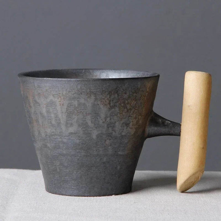 Handmade vintage ceramic coffee mug with wooden handle, 260ml, rustic matte black finish, Nordic Essentials UK